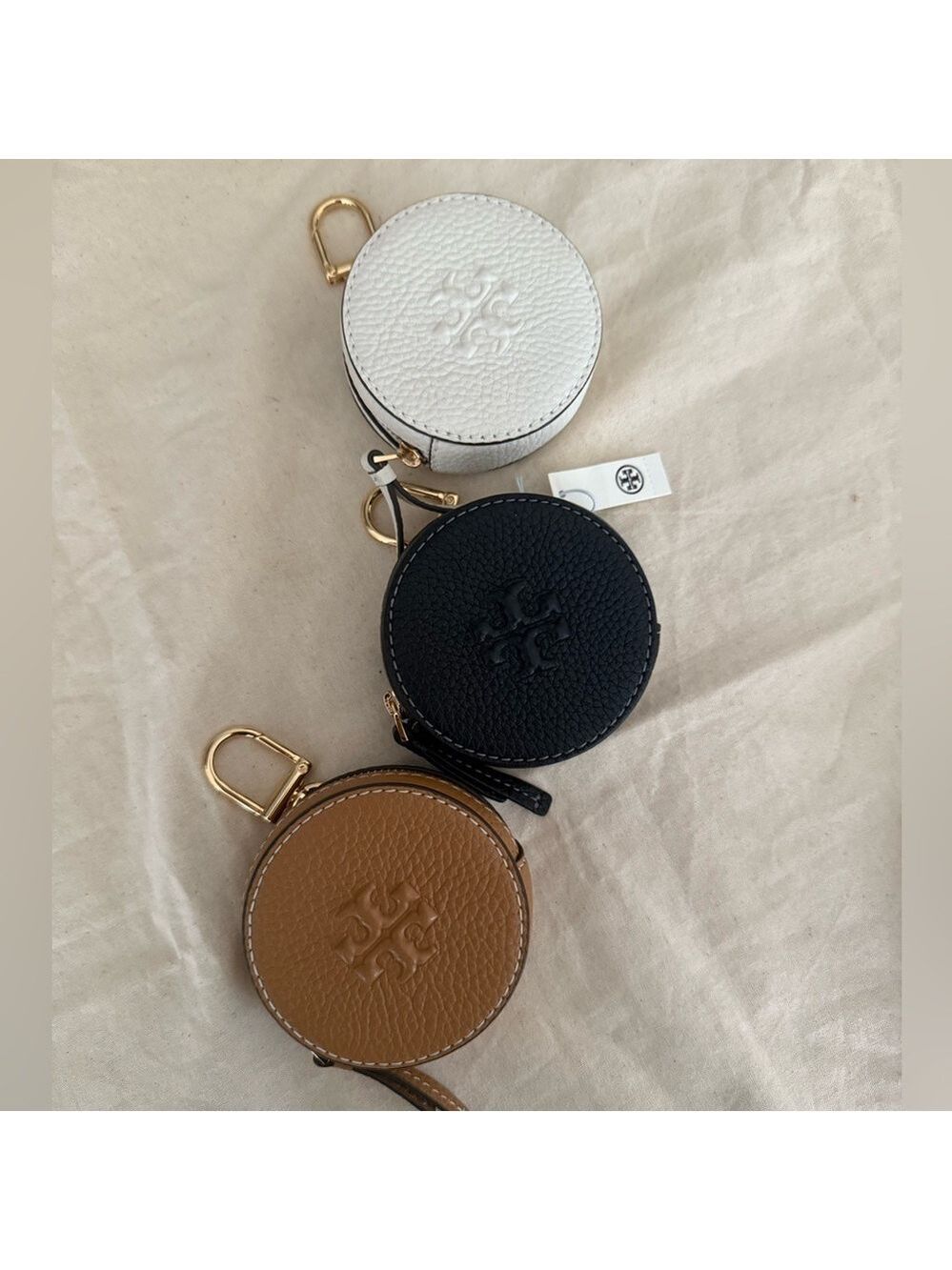 Tory Burch Round Coin Purses in White, Black, and Tan